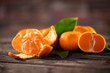 Mandarins. Tangerines close-up on a wooden background.