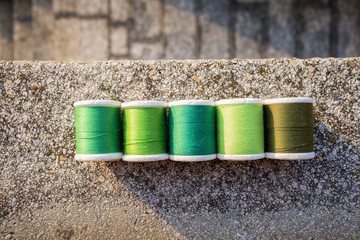 Shades of green , Rolls of yarn