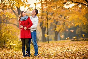 Girlfriend with boyfriend embraced in park