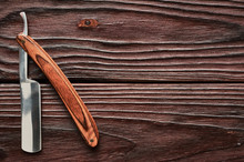 Vintage Barber Shop Straight Razor Tool On Wooden Background