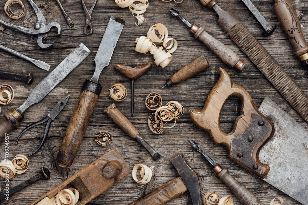 Old carpentry tools on the workbench - obrazy, fototapety, plakaty 