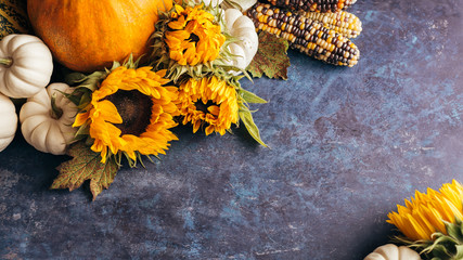 Wall Mural - pumpkins, sunflowers and autumn leaves.