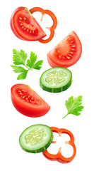 Poster - Isolated slices of vegetables. Falling cut cucumber, tomato and bell pepper (salad ingredients)  isolated on white background with clipping path