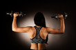 © Samo Trebizan - Active young woman wprkout with dumbbells in a fitness gym