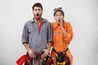 © wayhome.studio  - Human facial expressions, emotions, feelings, reaction and attitude. Portrait of couple male and female mechanics looking at camera in full disbelief, feeling shocked, astonished and surprised