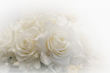 Fototapeta Dmuchawce - White roses bouquet surrounded by white light.