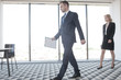 © alotofpeople - Business speaker coming to conference room