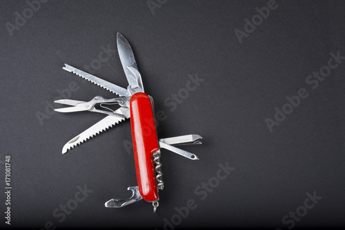 Fotografía Multi task army knife on white background