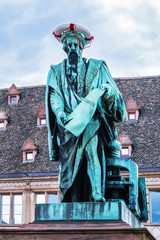 Gutenberg Monument (1840) - Bronze on a granite base, with four relief panels. From 1439 to 1444, Johannes Gutenberg, inventor of letterpress printing, lived in Strasbourg. Strasbourg, Alsace, France.