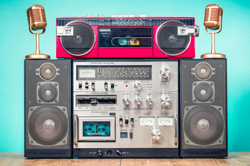 Wall Mural - retro outdated hi fi stereo cassette boom box system, red radio tape recorder from 80s and golden mi