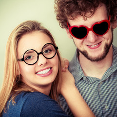 Wall Mural - Happy couple man and woman in glasses.