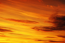 Photo Of Orange Sunset With Dark Clouds On Sky