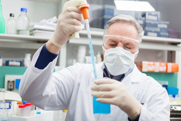 Poster - Researcher at work in a laboratory