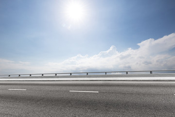 empty road with blue cloud sky