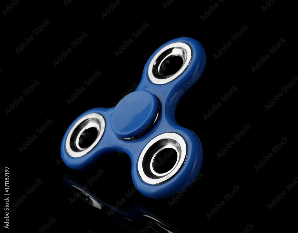 Modern spinner on dark mirror background