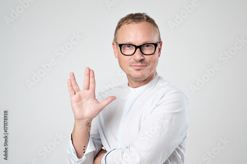 Cuadros en Lienzo Vulcan greeting. Man welcomes fans of fiction films