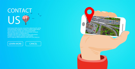 Canvas Print - mobile application web page hand holding phone with city map