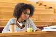 © Yakobchuk Olena - Smart female student preparing for lecture