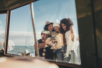 Wall Mural - Friends taking selfie on holiday