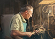 © olly - Craftsman in his laboratory