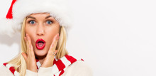 Happy Young Woman With Santa Hat On A White Background