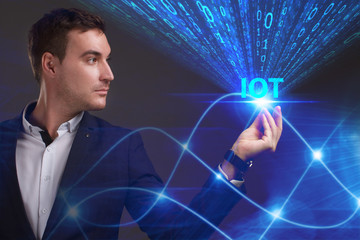 business, technology, internet and network concept. young businessman working on a virtual screen of