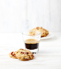 Wall Mural - Butter Cookies with dried Cranberries and a Glass of Espresso