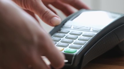 Poster - Close-up shot of person using credit card for mobile payment