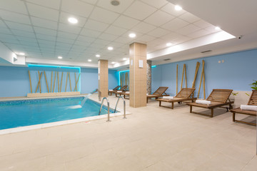 Indoor swimming pool in hotel spa center