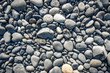 © Kozioł Kamila - Textura with different sized stones lying on the beach in Iceland