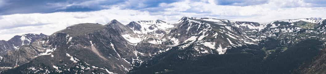 Wall Mural - Summer snow in the mountains. Journey to the Rocky Mountain National Park