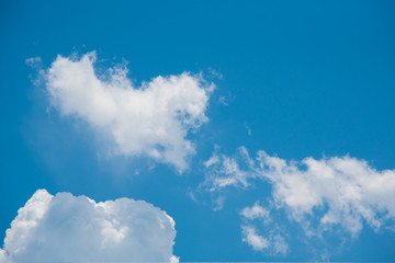 view of bright blue sky and beautiful heart shape cloud as paradise on sunny day. bright blue sky an