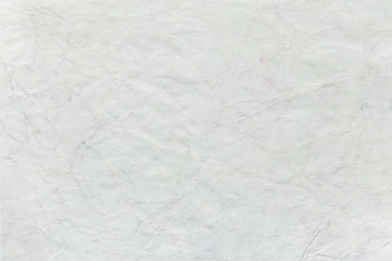 Crumpled white paper sheet, texture background