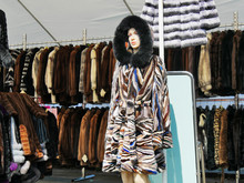 Fashionnable Hooded Fur Coat On Mannequin