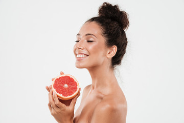 Wall Mural - Close up portrait of a beautiful smiling woman