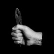 nipper - tools in a man's hand - black and white photo