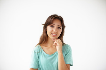 Wall Mural - Portrait of unhappy sorrowful concerned hurt young mixed race brunette woman feeling sorry for doing something wrong, her eyer full of regret. Human facial expressions, emotions and feelings