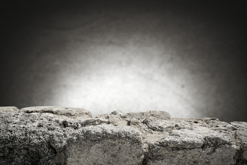 rock table background and gray dark wall space 