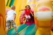 © Angelov - Joyful little girl playing on a trampoline.