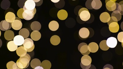 Wall Mural - blurred chtistmas lights over dark background