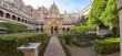 Mudejar cloister of Guadalupe Monastery with sundial. Panoramic view