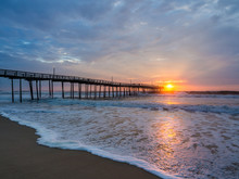 Sunrise Over Fishing Pier At North Carolina Outer Banks