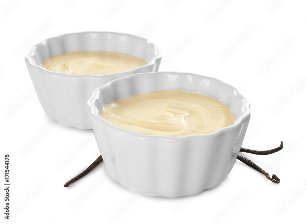 Vanilla pudding in ceramic bowls isolated on white