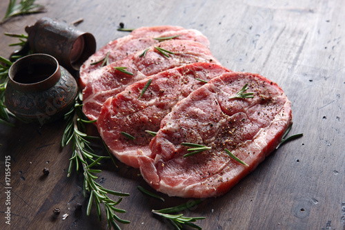 Fotografie, Obraz Pork steak with rosemary, garlic and pepper