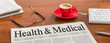 © Zerbor - A newspaper on a wooden desk - Health and Medical
