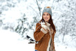beautiful young woman with ice skates go to the rink