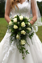 Bride Holding Cascading Bridal Bouquet