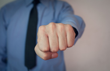 Wall Mural - Man showing punch.