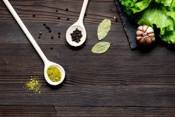 Wall Mural - spices for cooking on wooden table top view