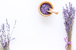 bath salt in herbal cosmetic with lavender on white desk background top view space for text